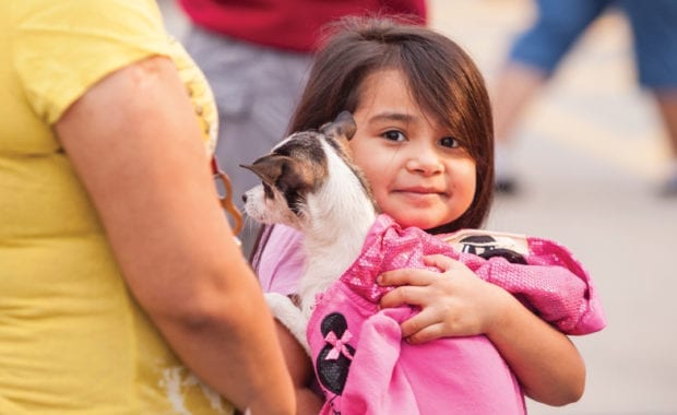 little girl with dog